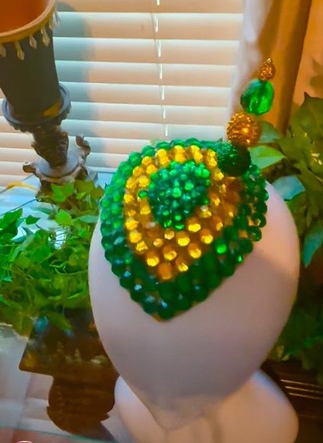 Green and gold beaded fascinator