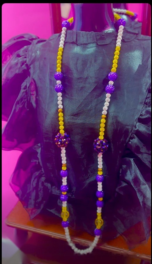 Purple, gold and white beaded necklace
